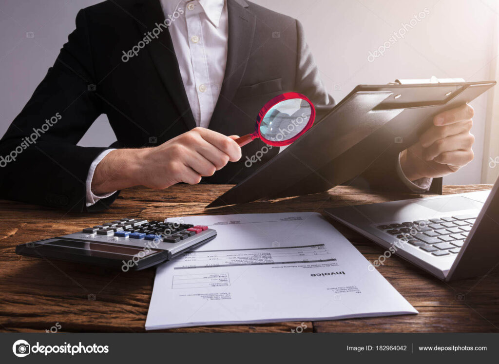 depositphotos 182964042 stock photo businessperson analyzing document clipboard magnifying